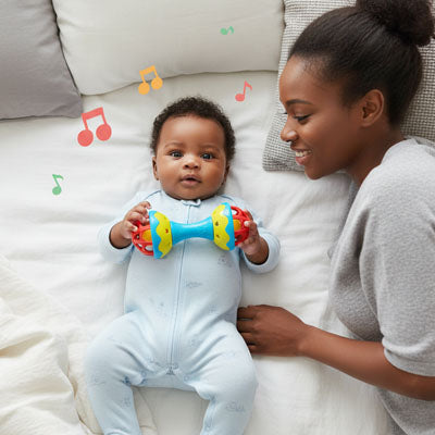 HOCHET BEBE DOUBLE_ TETE AVEC POIGNET BLUE CIEl